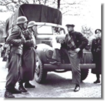 Dutch driver talking to German guards